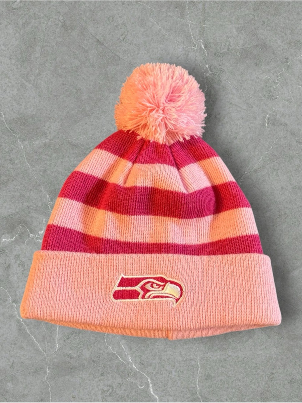 NFL Pink and Coral Striped Pom Pom Beanie with Seahawks Team Crest